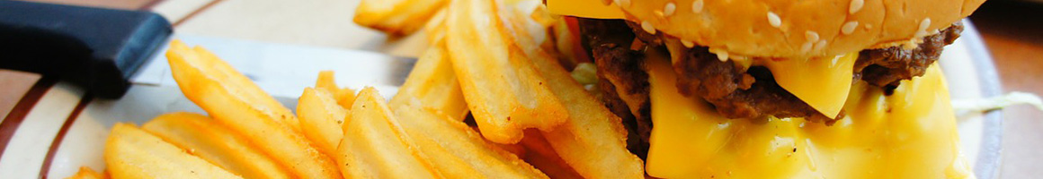 Eating Burger at Bill's Cafe restaurant in Kingwood, TX.